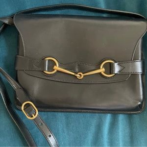 Gucci Black Leather Bag with Gold Accents